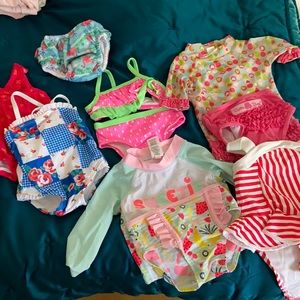Lot of baby swimsuits. 0-3, 3-6, 6-9, 6-12 months
